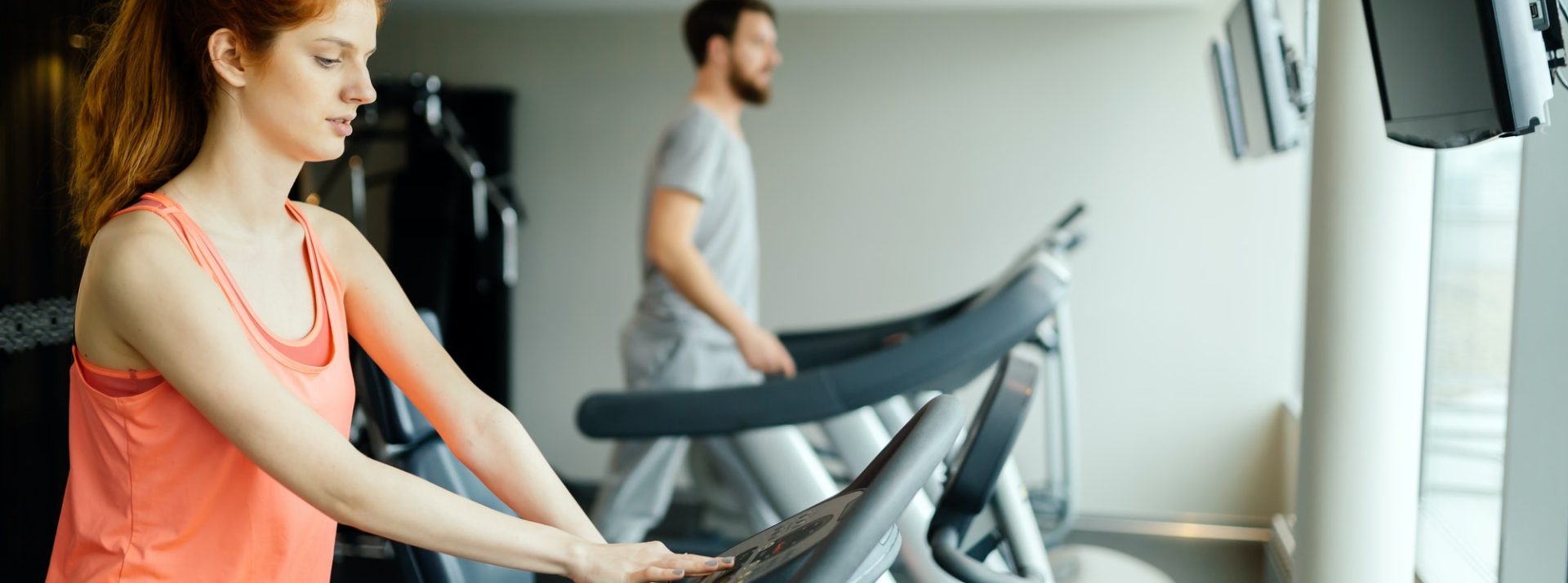 People cardio exercising in gym